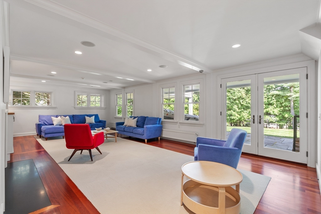 168 Nashawtuc Road Concord, MA 01742 - Photo 35 of 42 a living room with furniture and a large window