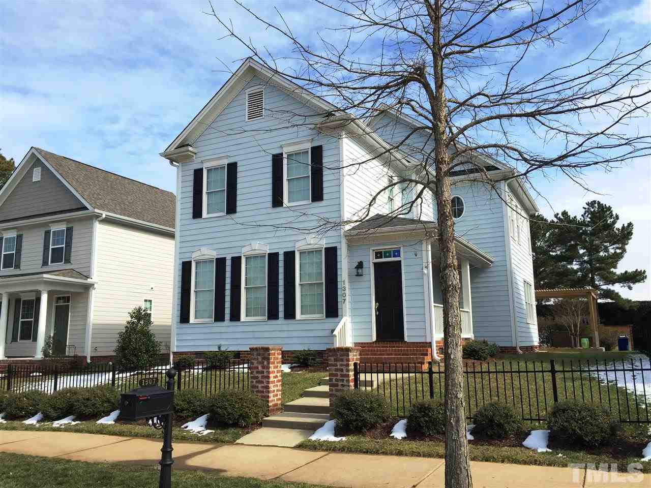 1307 Ileagnes Road Raleigh, NC 27603 - Photo 1 of 24 Charleston style home with rear entry attached garage.