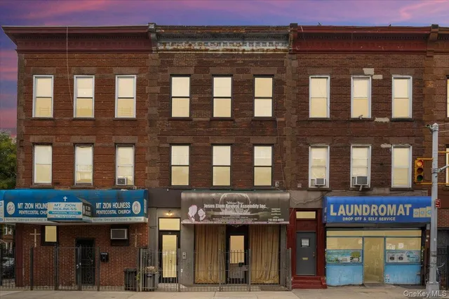 a view of a food market with retail stalls