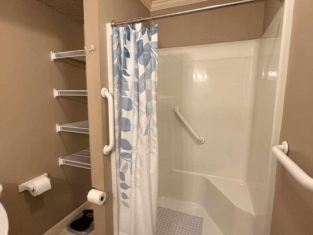 7 Conant Road, Unit 21 Winchester, MA 01890 - Photo 12 of 27 a bathroom with a shower