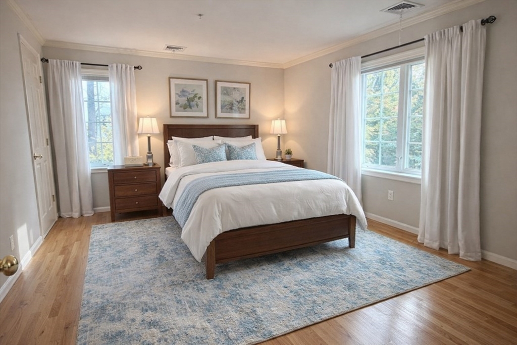 7 Conant Road, Unit 21 Winchester, MA 01890 - Photo 13 of 27 a bedroom with a bed and a window