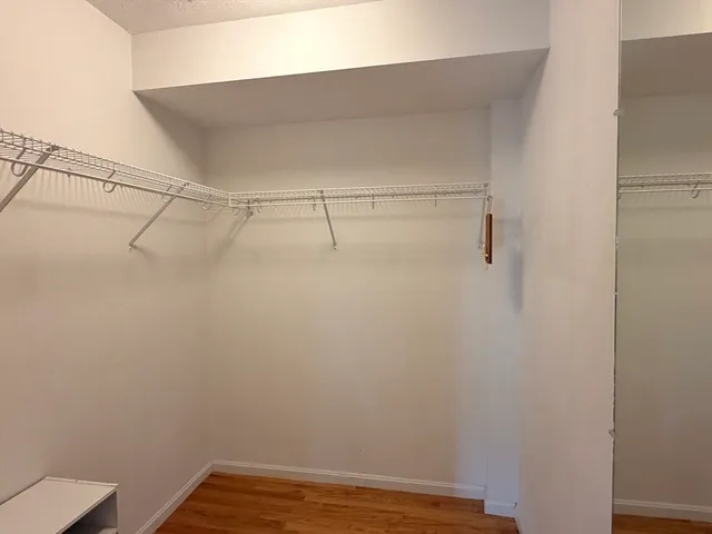 a view of a room with racks on the wall