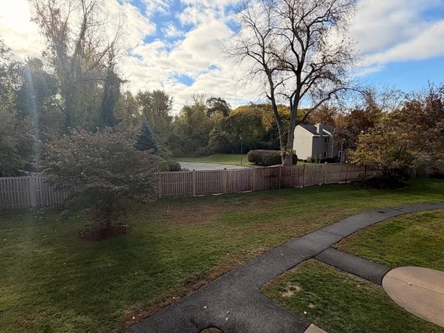 a view of a backyard with green space