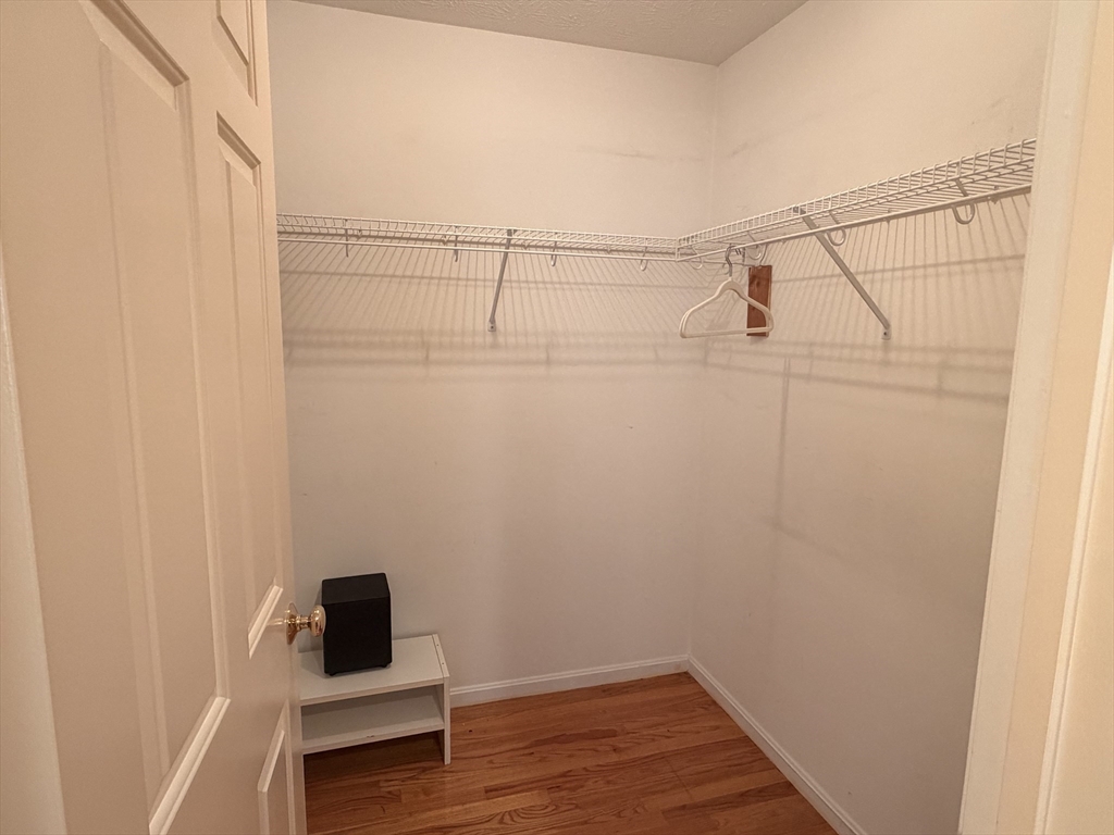 7 Conant Road, Unit 21 Winchester, MA 01890 - Photo 9 of 27 a view of small space with wooden floor