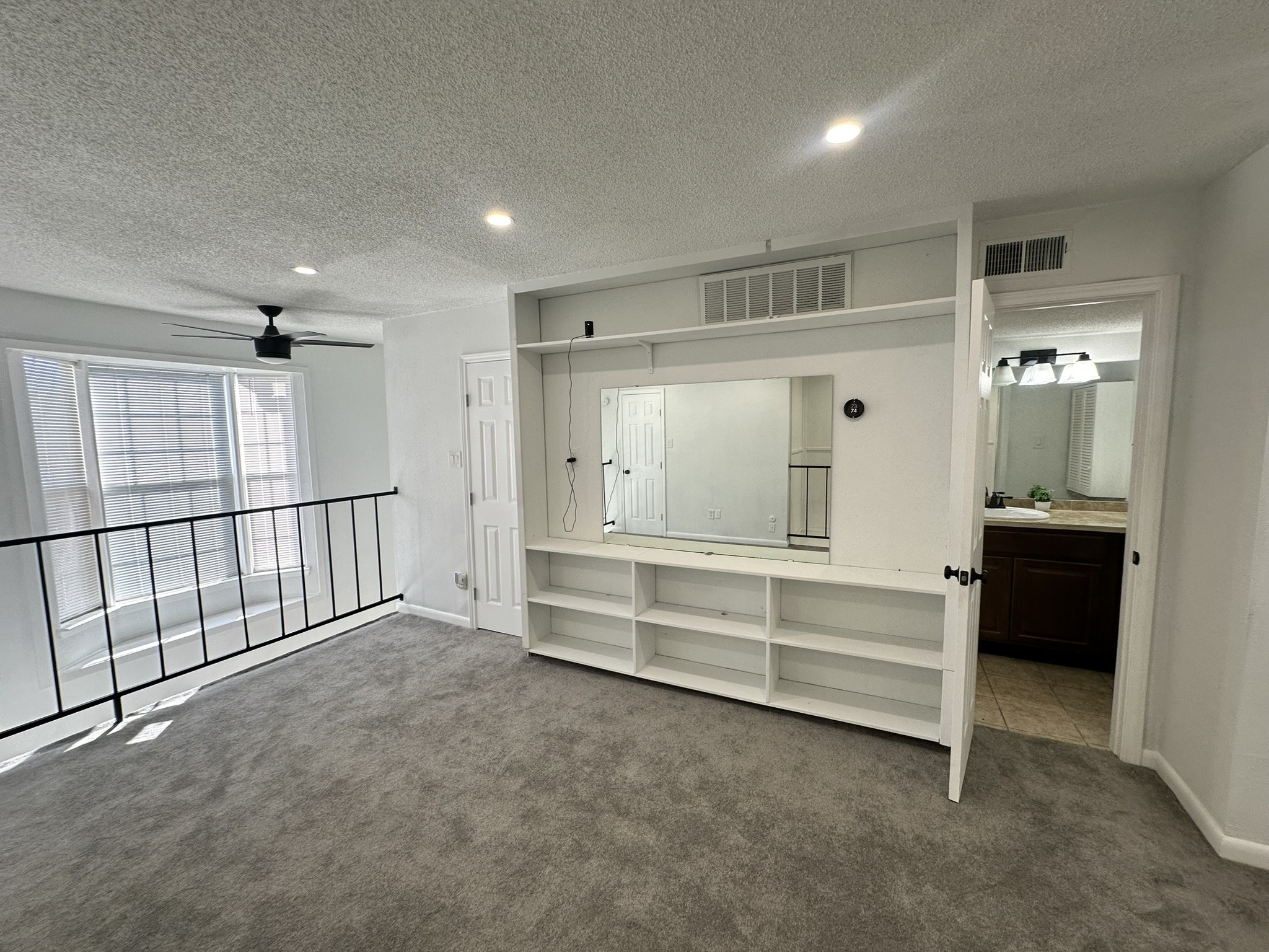 2800 Jeanetta Street, Unit 203 Houston, TX 77063 - Photo 23 of 34 a view of an empty room with a window