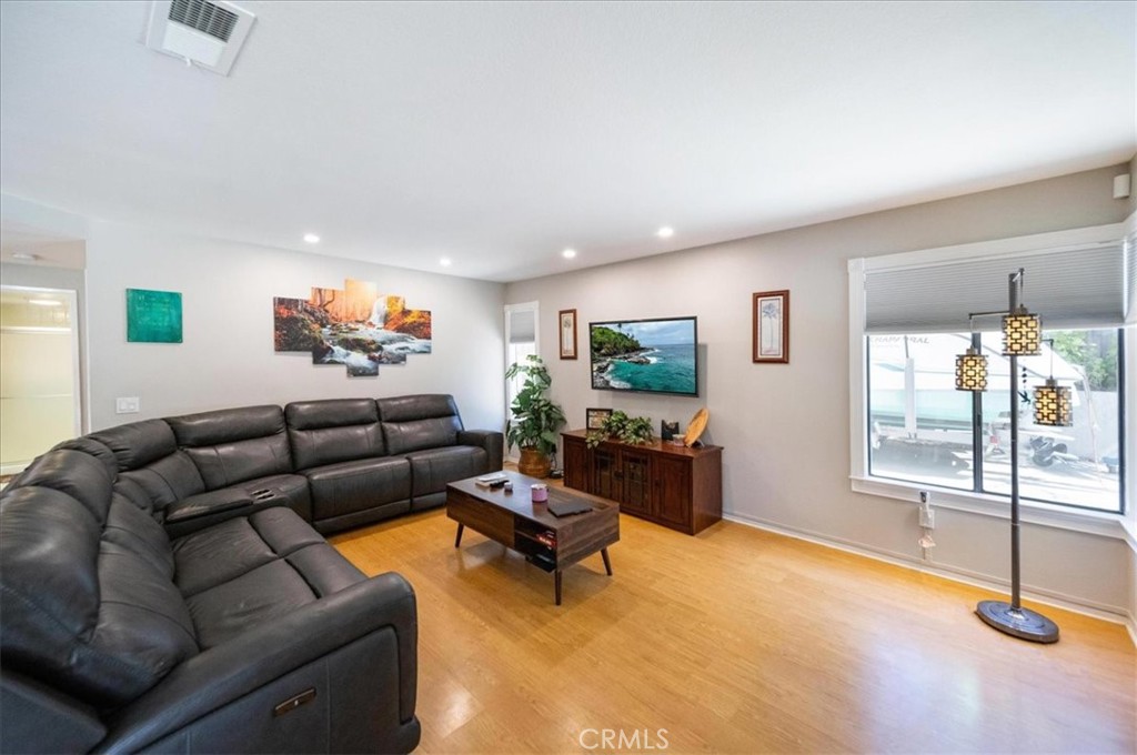 5963 Rio Valle Drive Bonsall, CA 92003 - Photo 11 of 49 a living room with furniture and a table