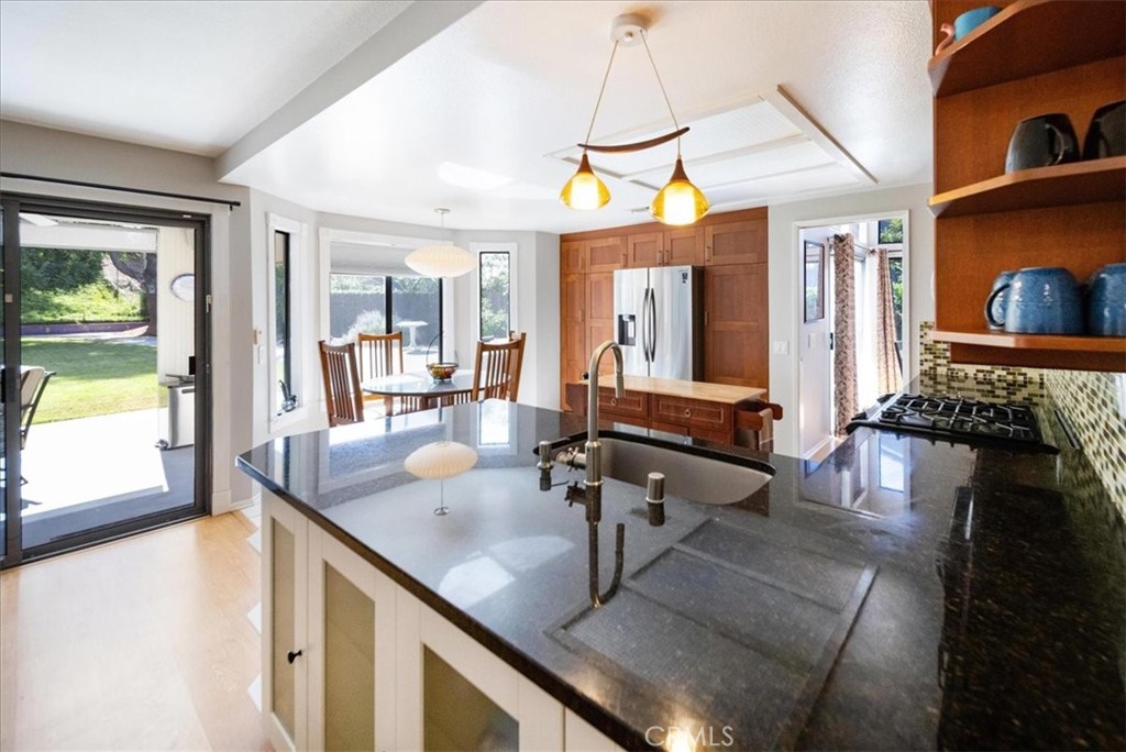 5963 Rio Valle Drive Bonsall, CA 92003 - Photo 14 of 49 a view of a living room and dining room