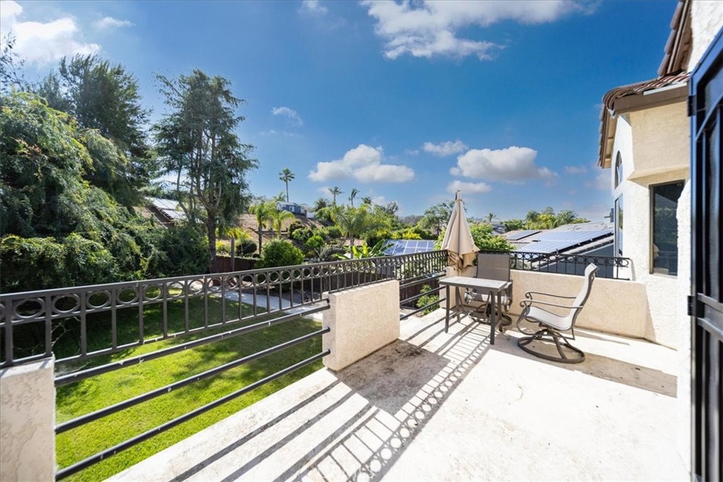 5963 Rio Valle Drive Bonsall, CA 92003 - Photo 38 of 49 a view of a chairs and table in the balcony