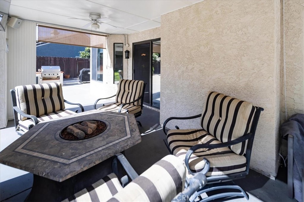 5963 Rio Valle Drive Bonsall, CA 92003 - Photo 40 of 49 a view of a dining room with furniture and a chandelier