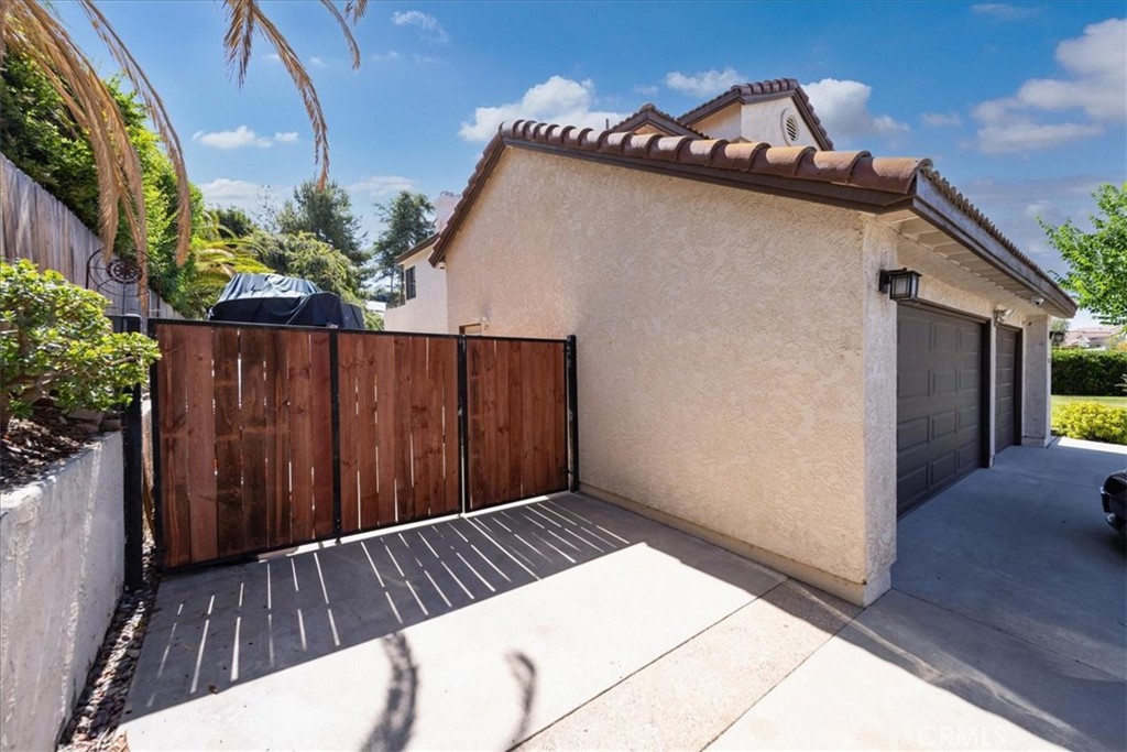 5963 Rio Valle Drive Bonsall, CA 92003 - Photo 5 of 49 a view of a house with a wooden fence