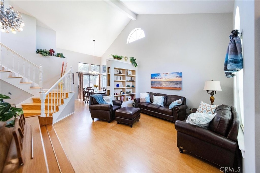 5963 Rio Valle Drive Bonsall, CA 92003 - Photo 7 of 49 a living room with furniture or couch and a wooden floor