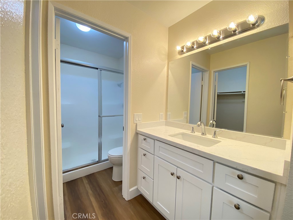 1084 North Jacaranda Road Colton, CA 92324 - Photo 13 of 19 a spacious bathroom with a double vanity sink and a mirror