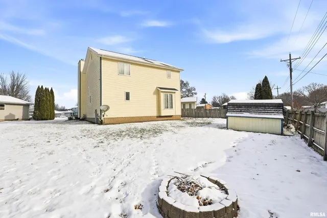 a view of a backyard with a tub and a sink