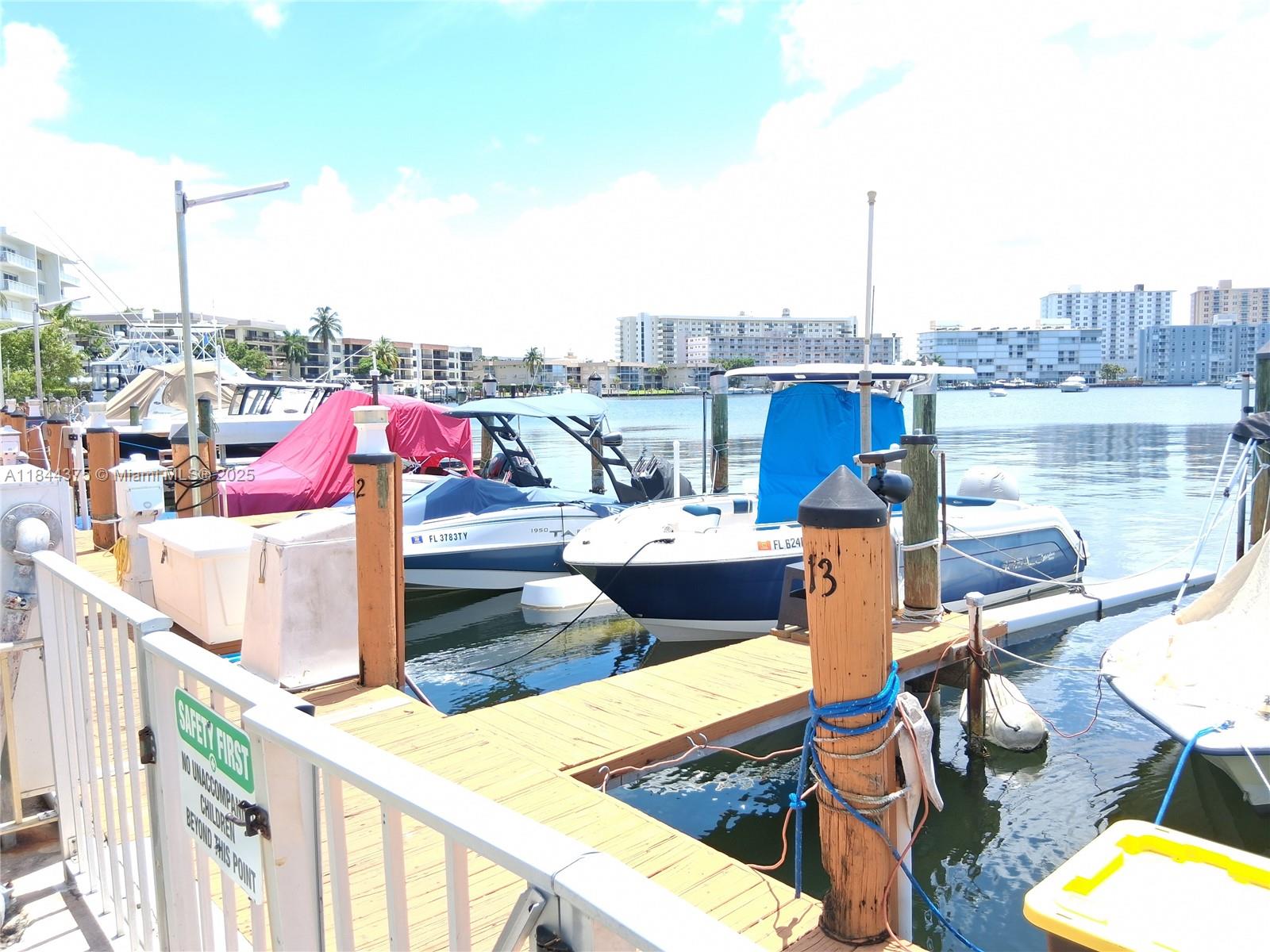 100 Golden Isles Drive, Unit 206 Hallandale Beach, FL 33009 - Photo 13 of 22 a view of a terrace with furniture
