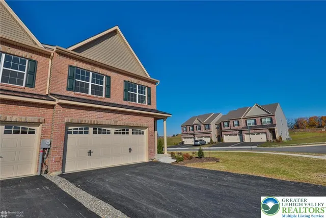 a view of a house with a swimming pool
