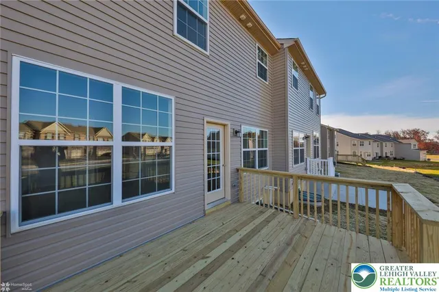a view of a house with a large window