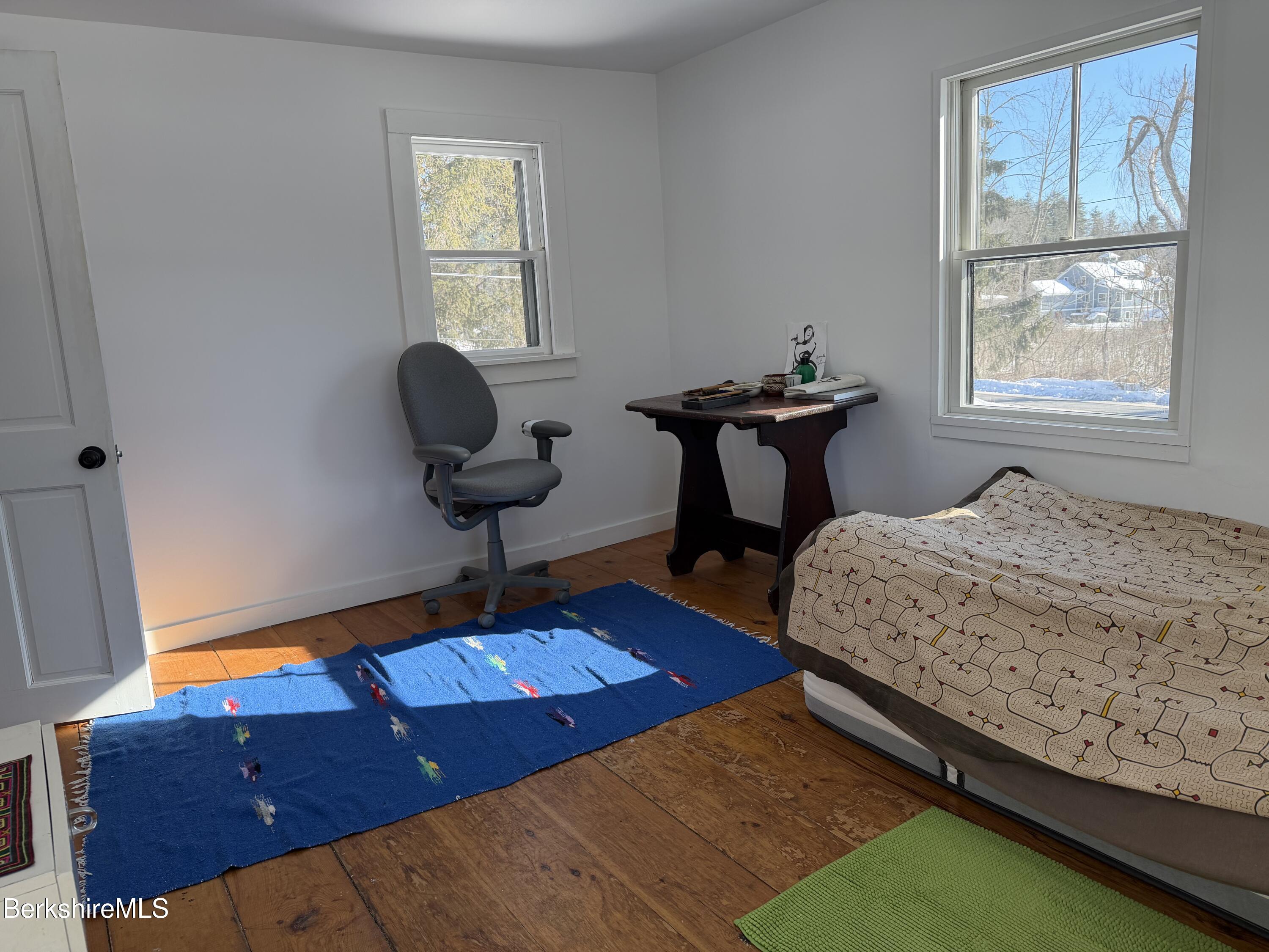 95 Water Farm Road Sheffield, MA 01257 - Photo 19 of 27 a bedroom with a bed and a window