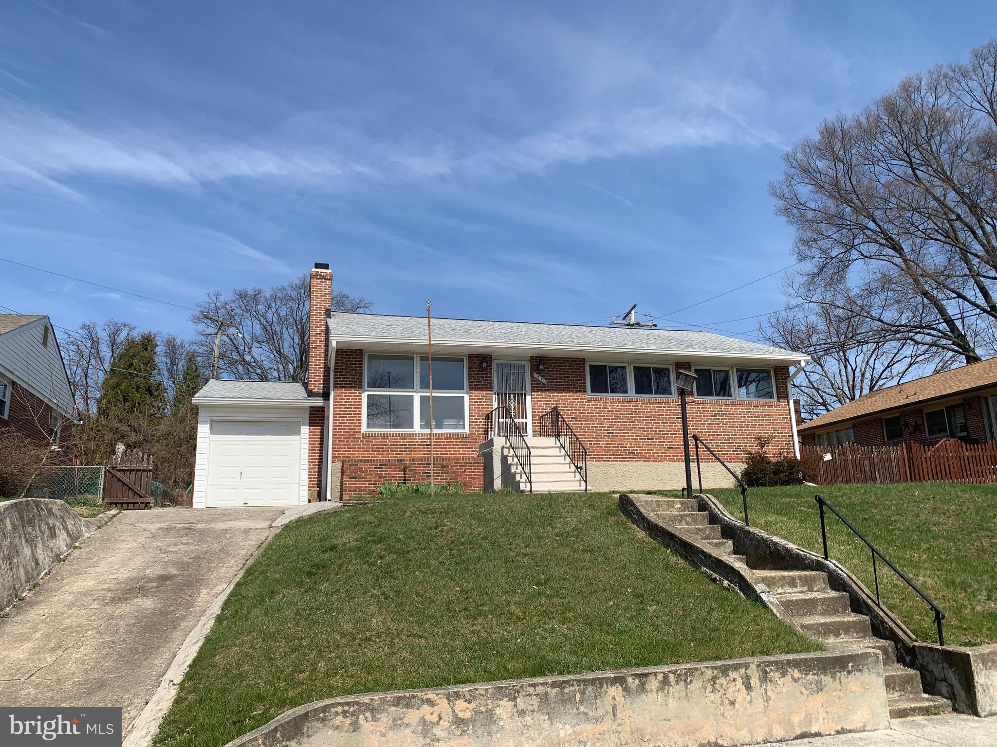 28 Othoridge Road Lutherville-Timonium, MD 21093 - Photo 27 of 27 a front view of a house with a garden