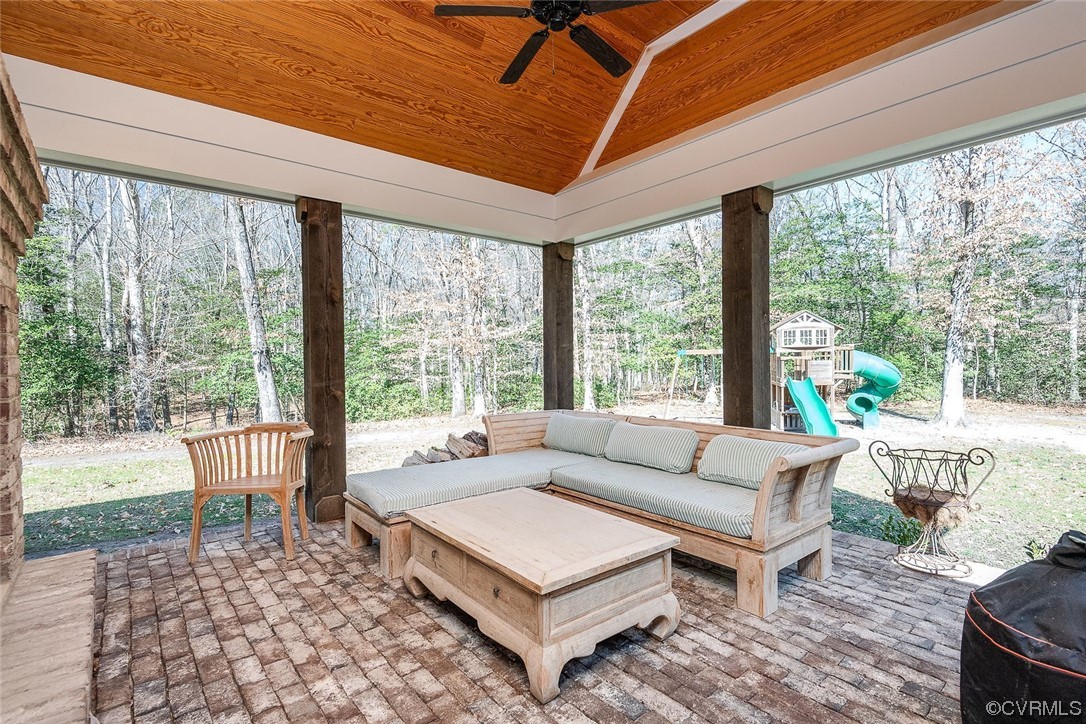 8401 Croaker Road Williamsburg, VA 23188 - Photo 28 of 48 a living room with furniture and a flat screen tv