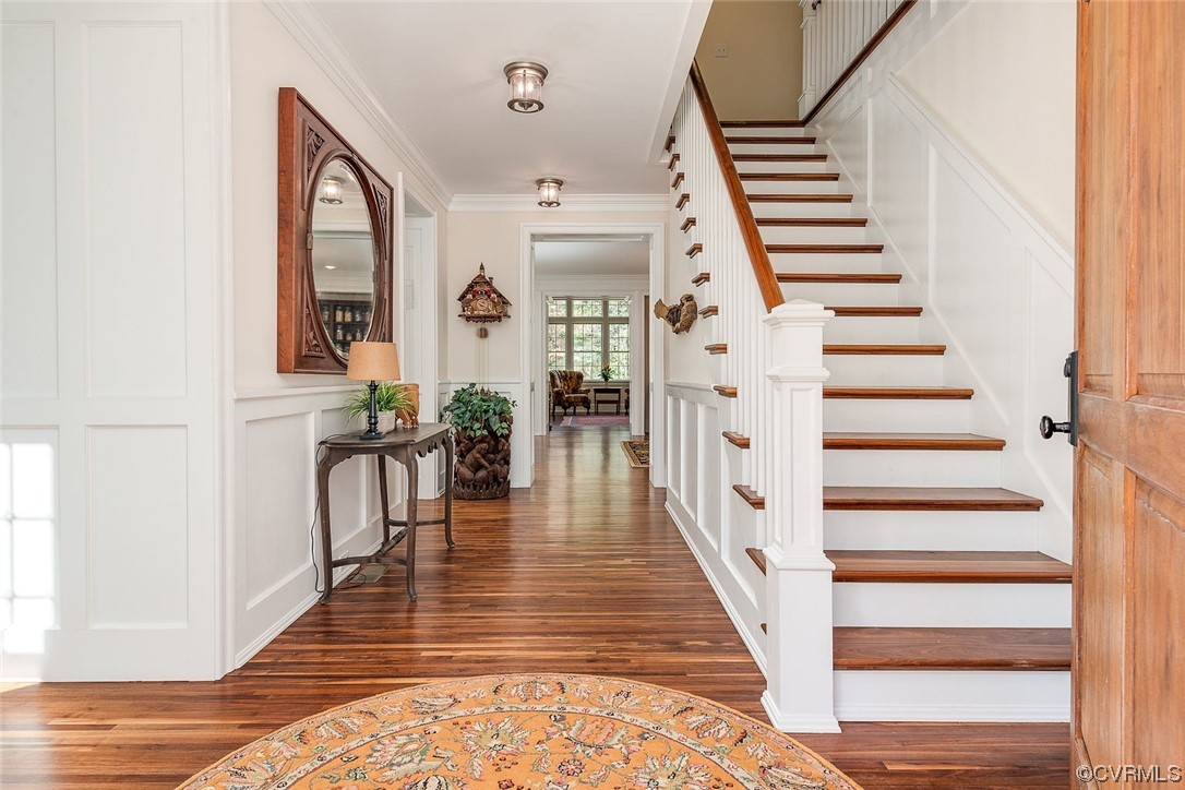 8401 Croaker Road Williamsburg, VA 23188 - Photo 8 of 48 a view of entryway and hall with wooden floor