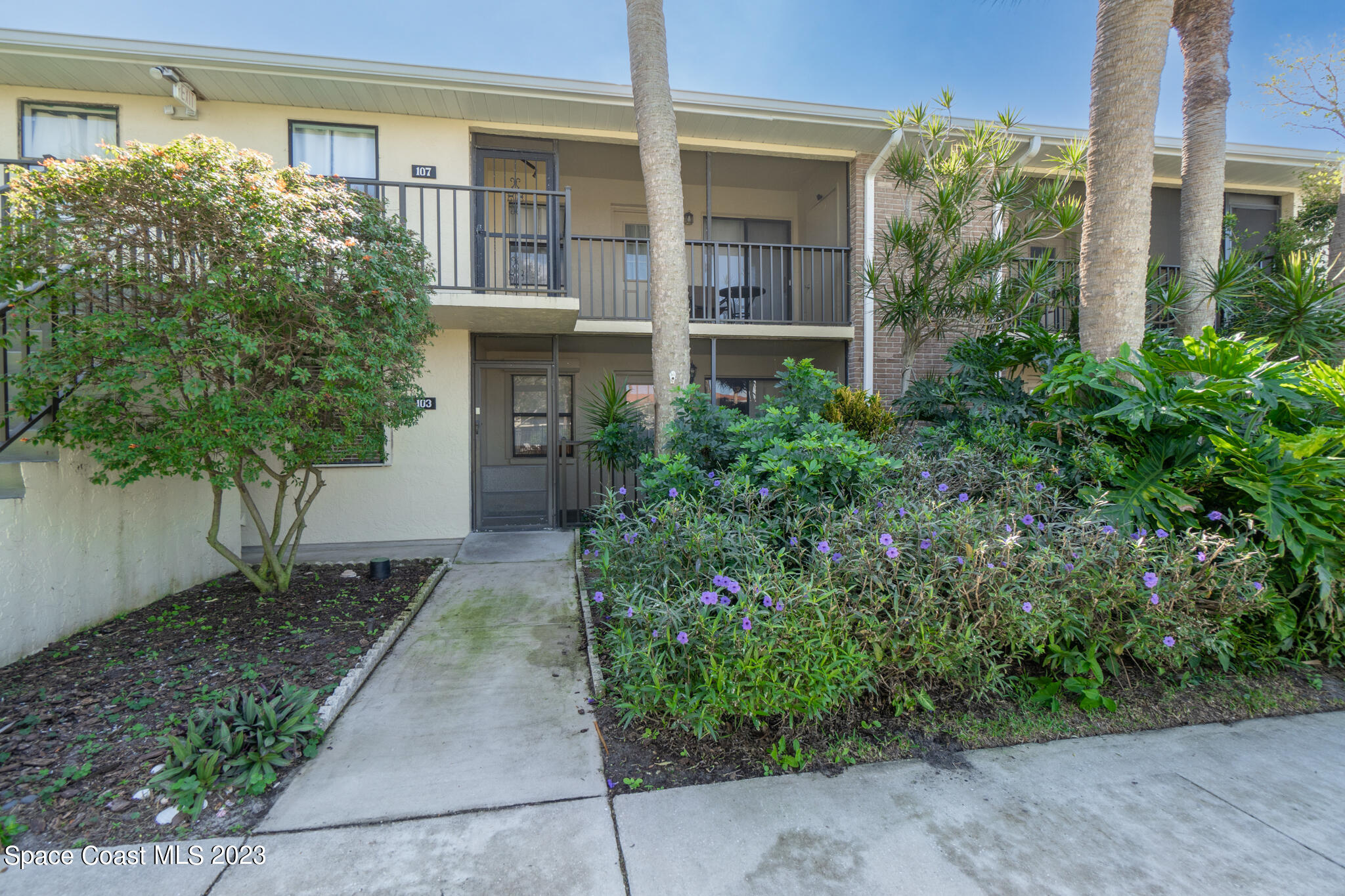 500 Catalina Road, Unit 103 Cocoa Beach, FL 32931 - Photo 2 of 28 front view of a house