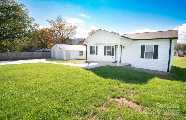 a house view with a garden space