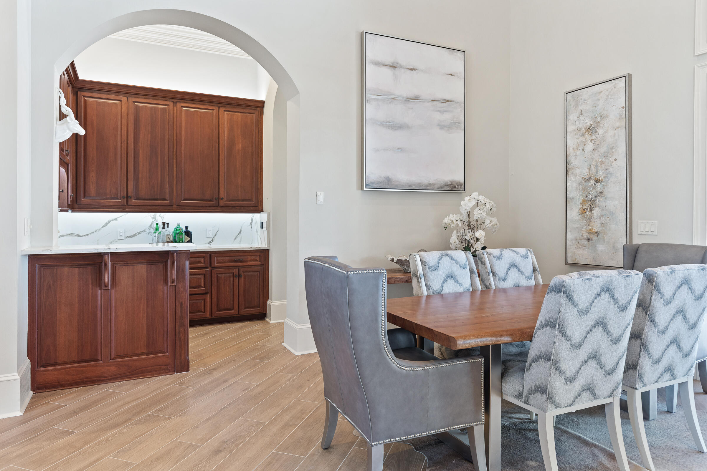 1806 Driftwood Point Road Santa Rosa Beach, FL 32459 - Photo 104 of 142 a dining room with furniture and wooden floor