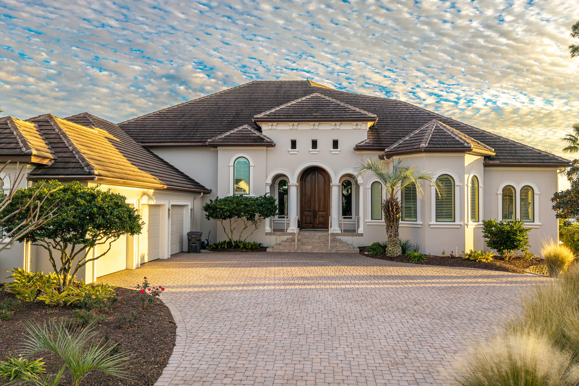 1806 Driftwood Point Road Santa Rosa Beach, FL 32459 - Photo 2 of 142 a front view of a house with a yard