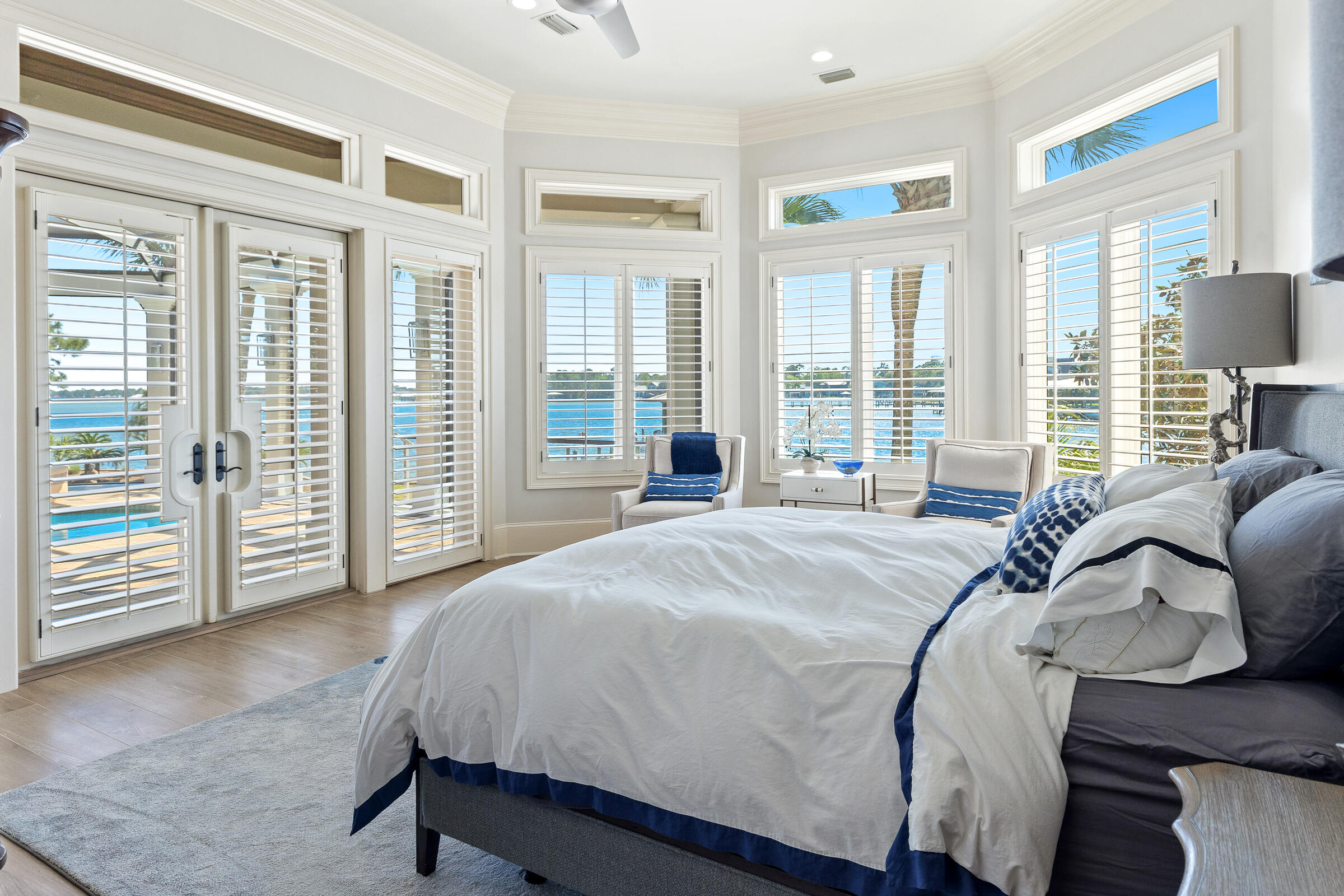 1806 Driftwood Point Road Santa Rosa Beach, FL 32459 - Photo 29 of 142 a spacious bedroom with a bed and glass door