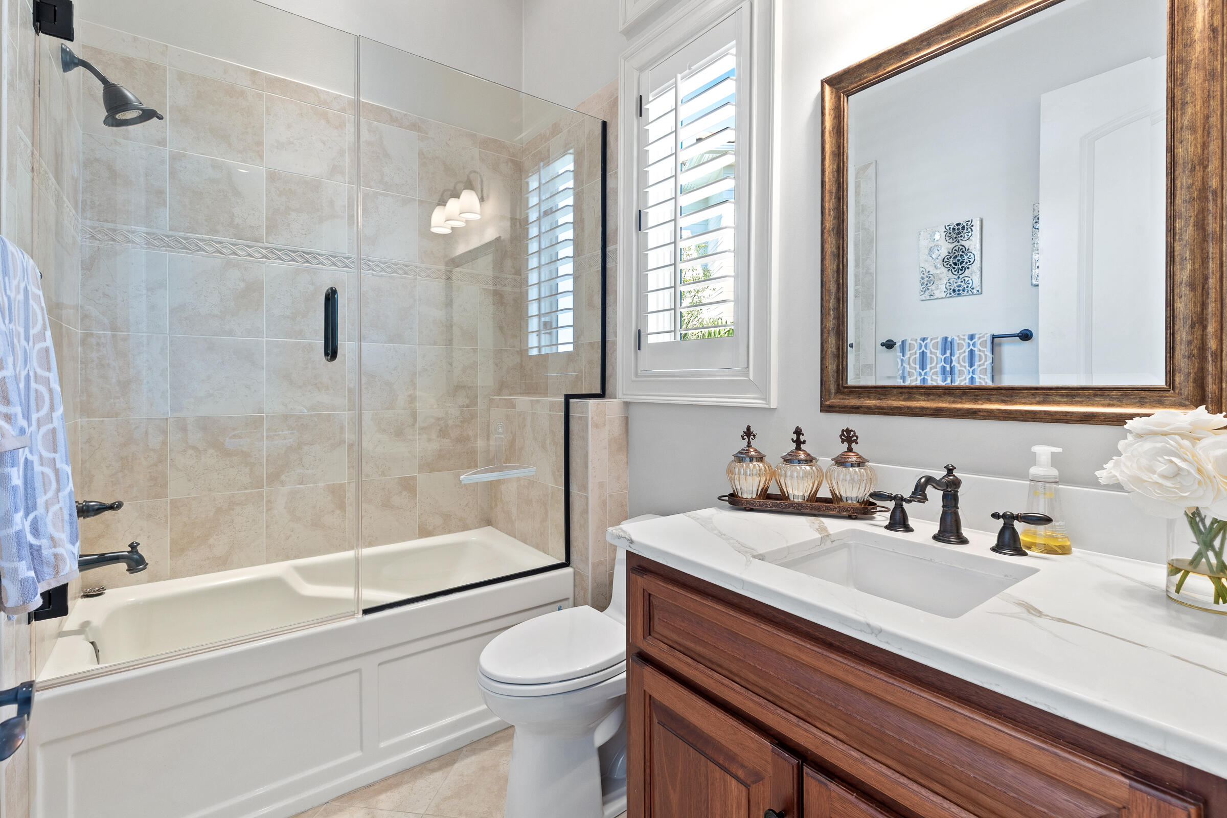 1806 Driftwood Point Road Santa Rosa Beach, FL 32459 - Photo 44 of 142 a bathroom with a sink a toilet and shower