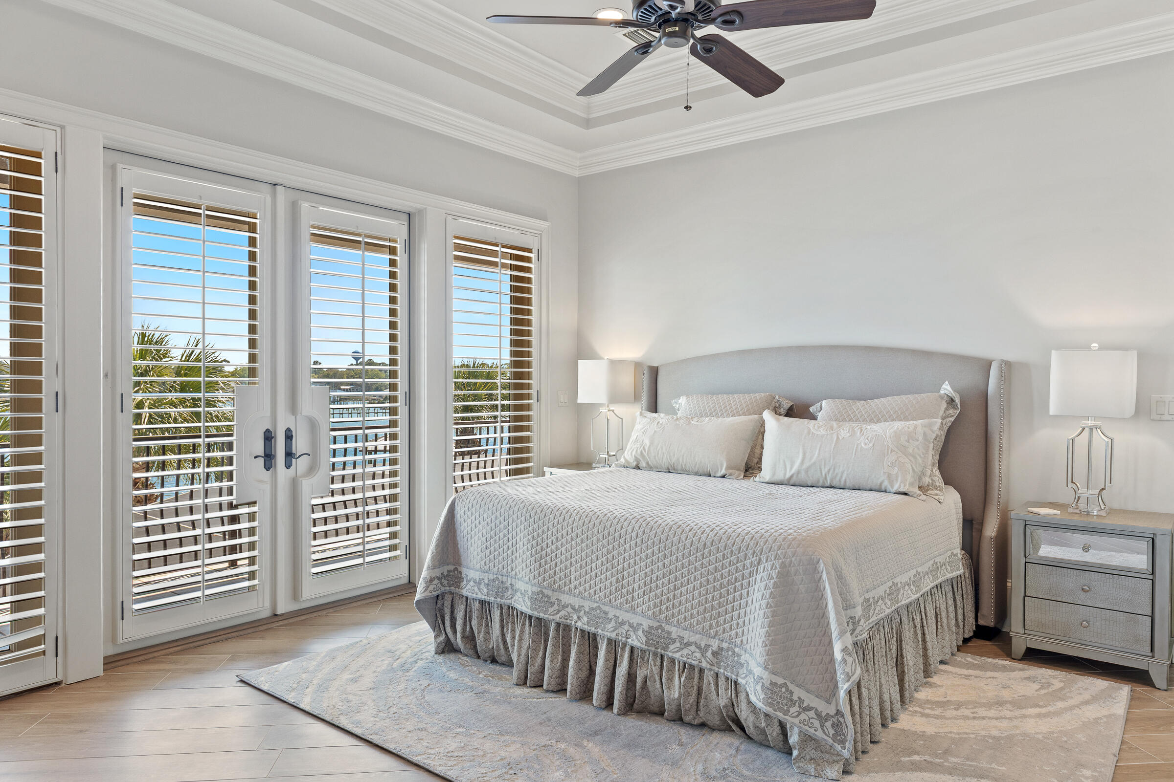 1806 Driftwood Point Road Santa Rosa Beach, FL 32459 - Photo 48 of 142 a bedroom with a large bed and ceiling fan