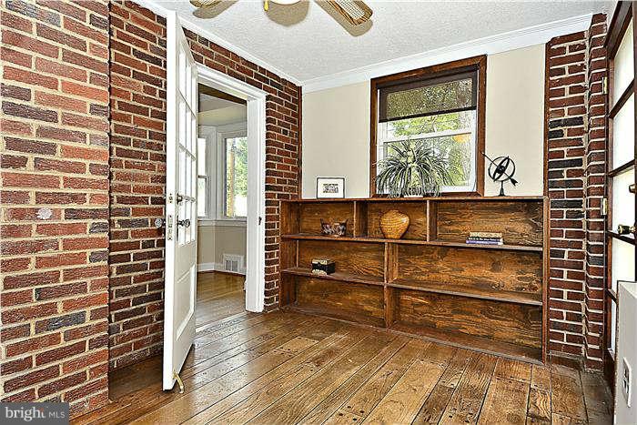 300 Dearborn Avenue Silver Spring, MD 20901 - Photo 17 of 30 a view of wooden floor in a room