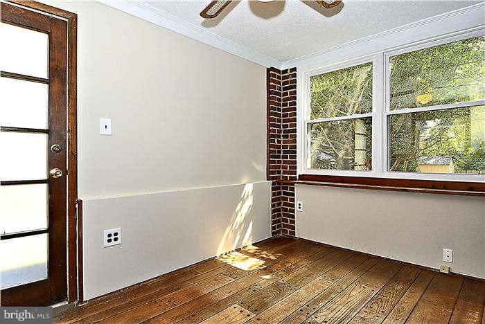 300 Dearborn Avenue Silver Spring, MD 20901 - Photo 18 of 30 an empty room with windows