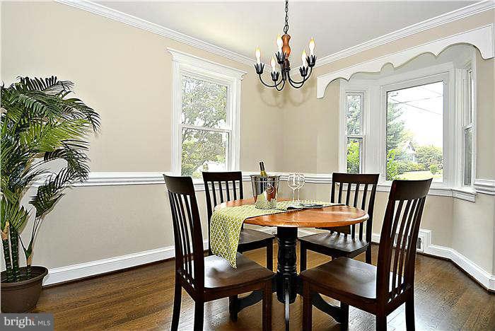 300 Dearborn Avenue Silver Spring, MD 20901 - Photo 3 of 30 a view of a dining room with furniture window and wooden floor