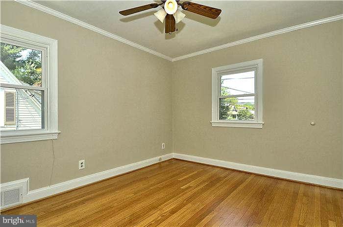 300 Dearborn Avenue Silver Spring, MD 20901 - Photo 22 of 30 a view of empty room with wooden floor