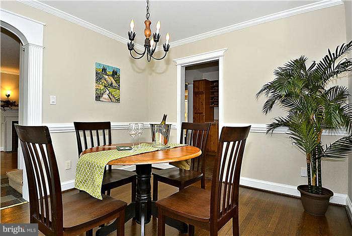 300 Dearborn Avenue Silver Spring, MD 20901 - Photo 6 of 30 a view of a dining room with furniture and wooden floor