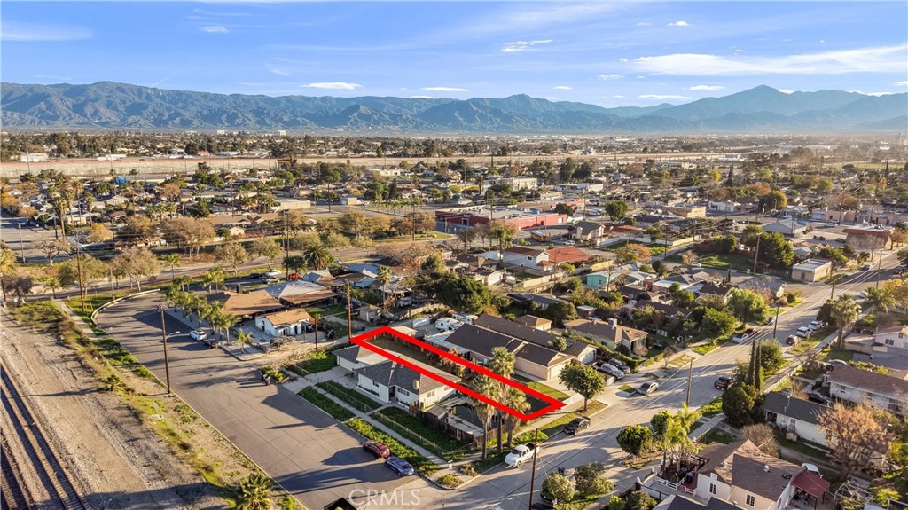 0 West O Grand Terrace, CA 92324 - Photo 7 of 10 an aerial view of residential houses with outdoor space and trees