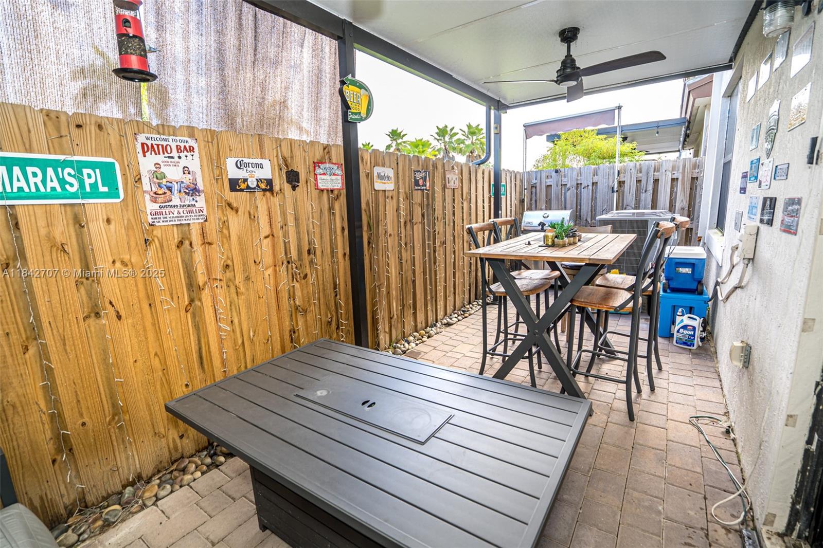 10118 Southwest 231st Lane Miami, FL 33190 - Photo 9 of 19 a balcony view with a table and chairs