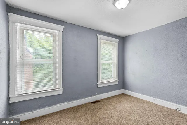 an empty room with a window