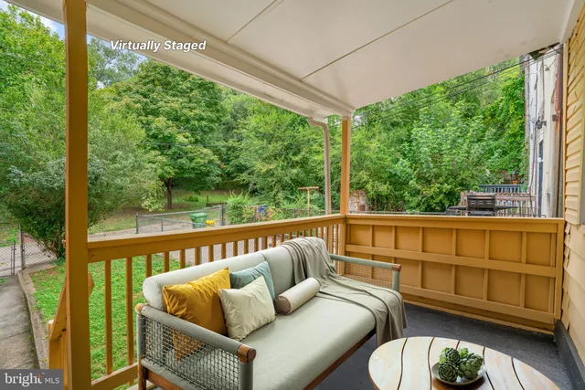 a balcony with furniture