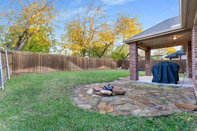 a view of a backyard with a slide