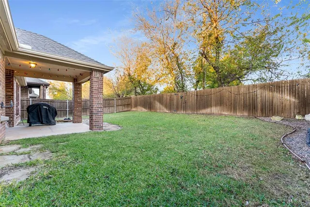 a view of a backyard with a garden