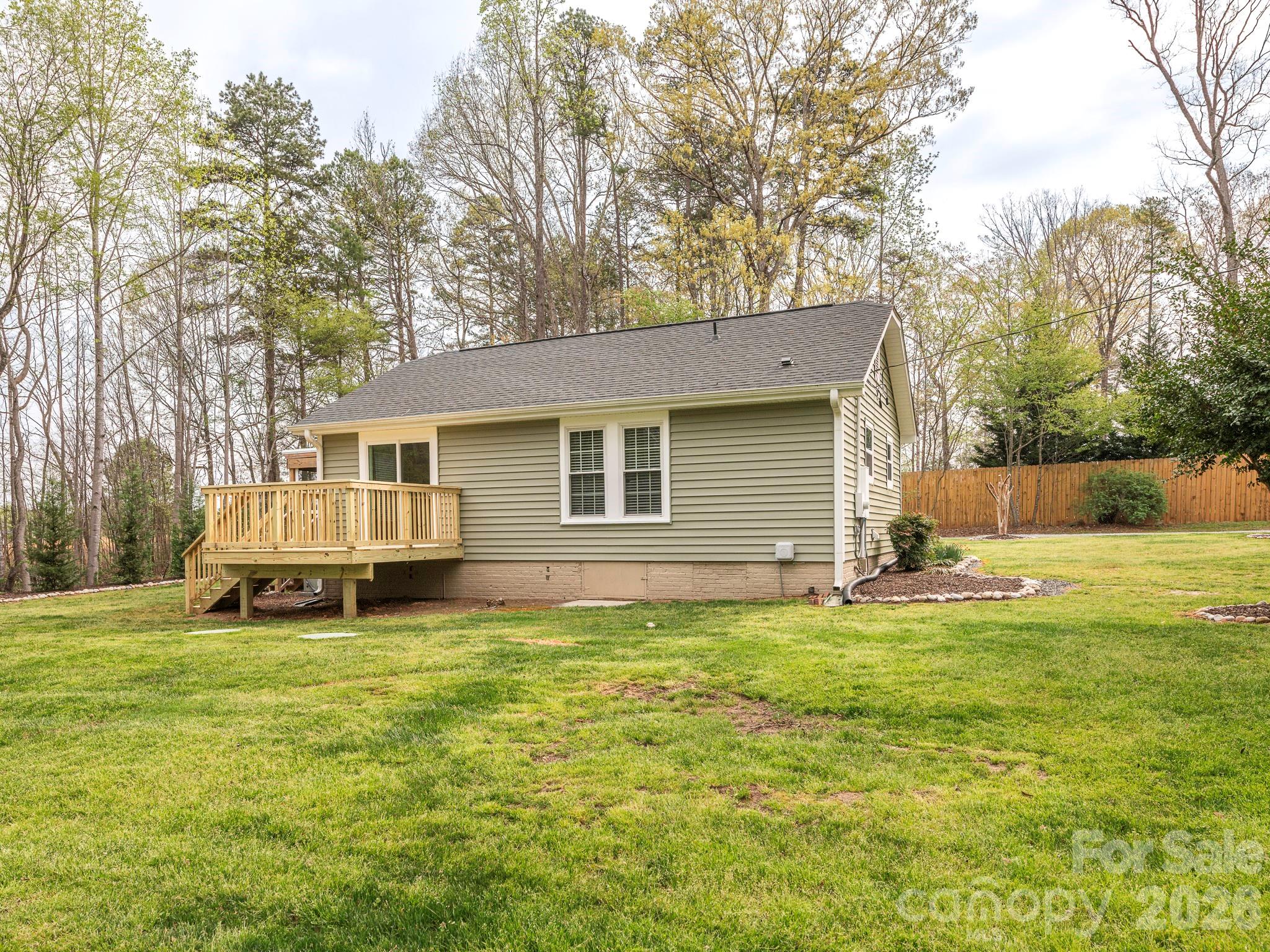 8202 Karriker Road Kannapolis, NC 28081 - Photo 4 of 12 a view of a house with a yard and sitting area