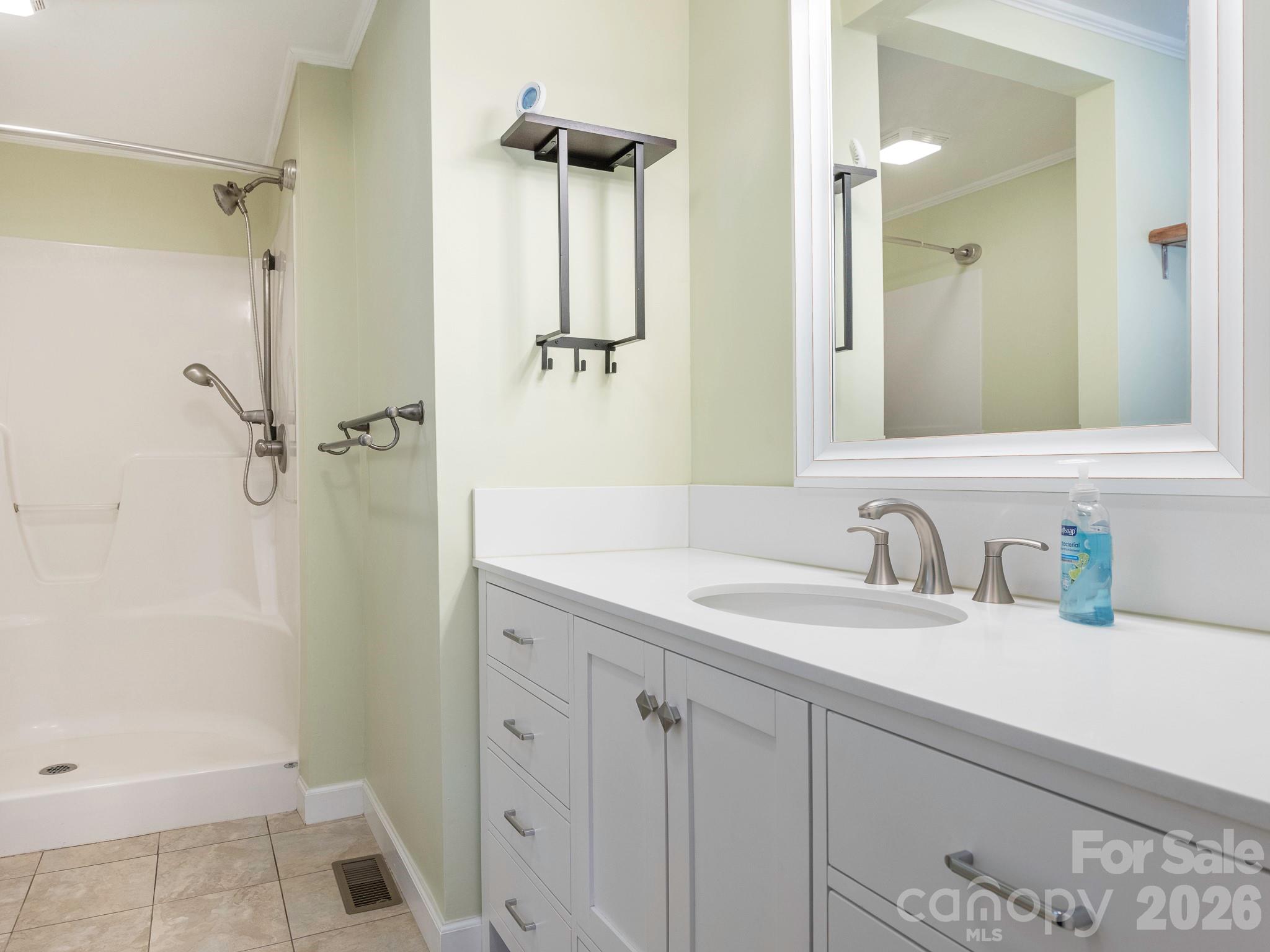 8202 Karriker Road Kannapolis, NC 28081 - Photo 9 of 12 a bathroom with a granite countertop sink mirror and double