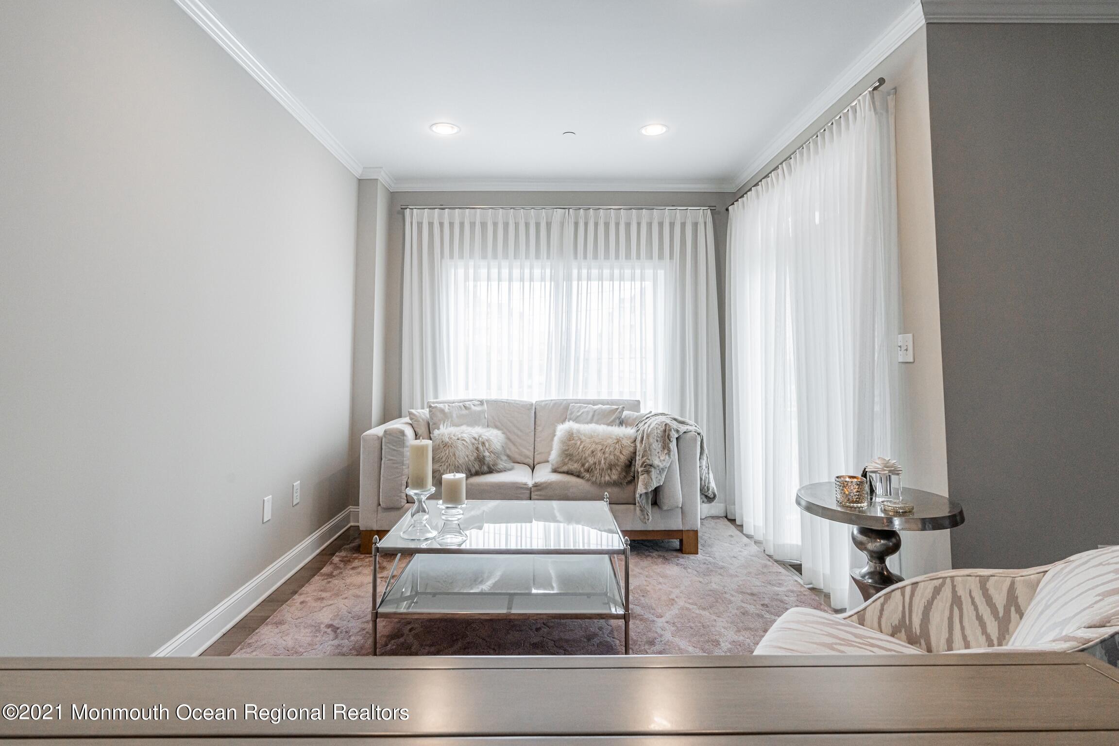 67 Ocean Terrace Long Branch, NJ 07740 - Photo 11 of 20 a living room with furniture and a window