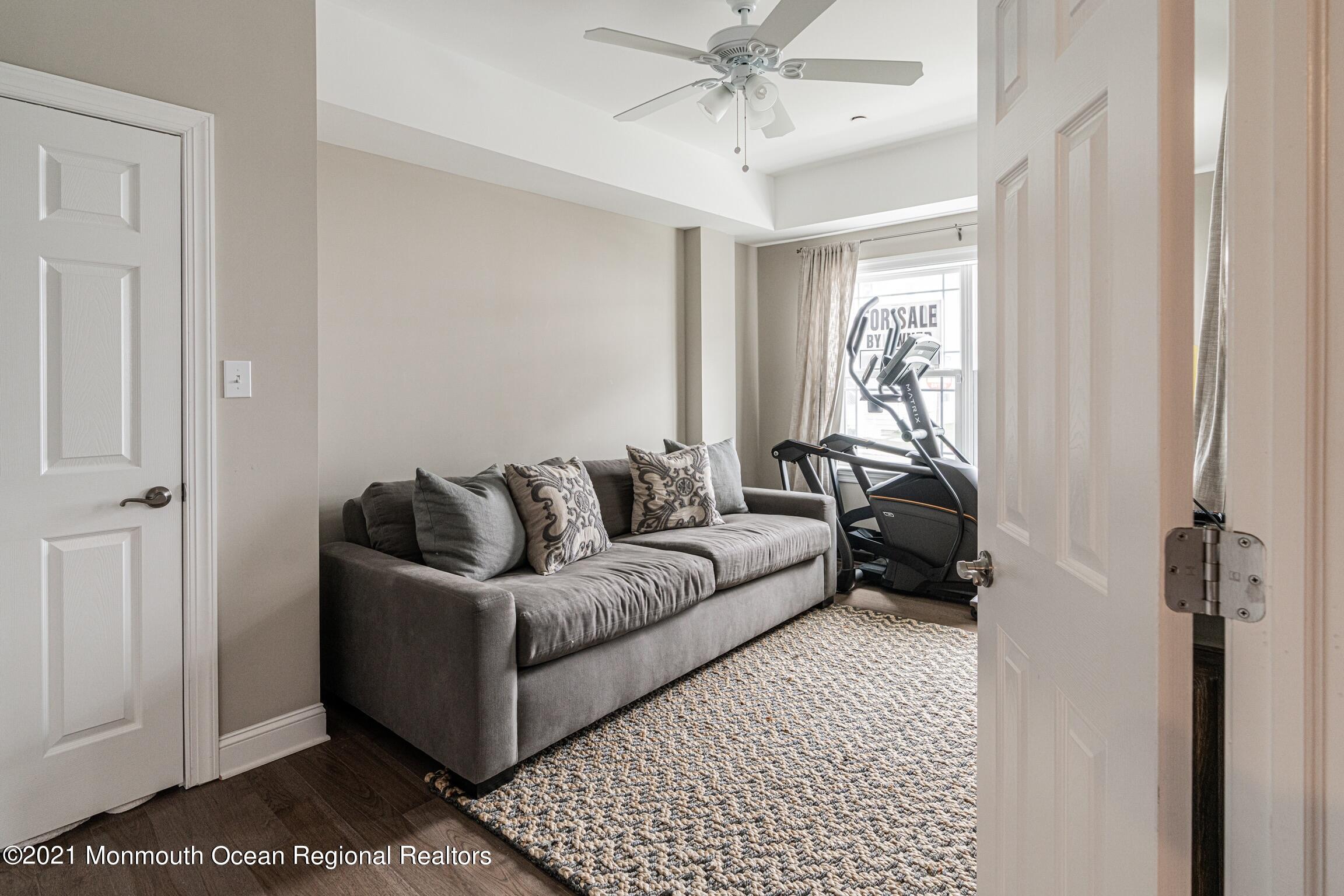 67 Ocean Terrace Long Branch, NJ 07740 - Photo 17 of 20 a living room with furniture and a window