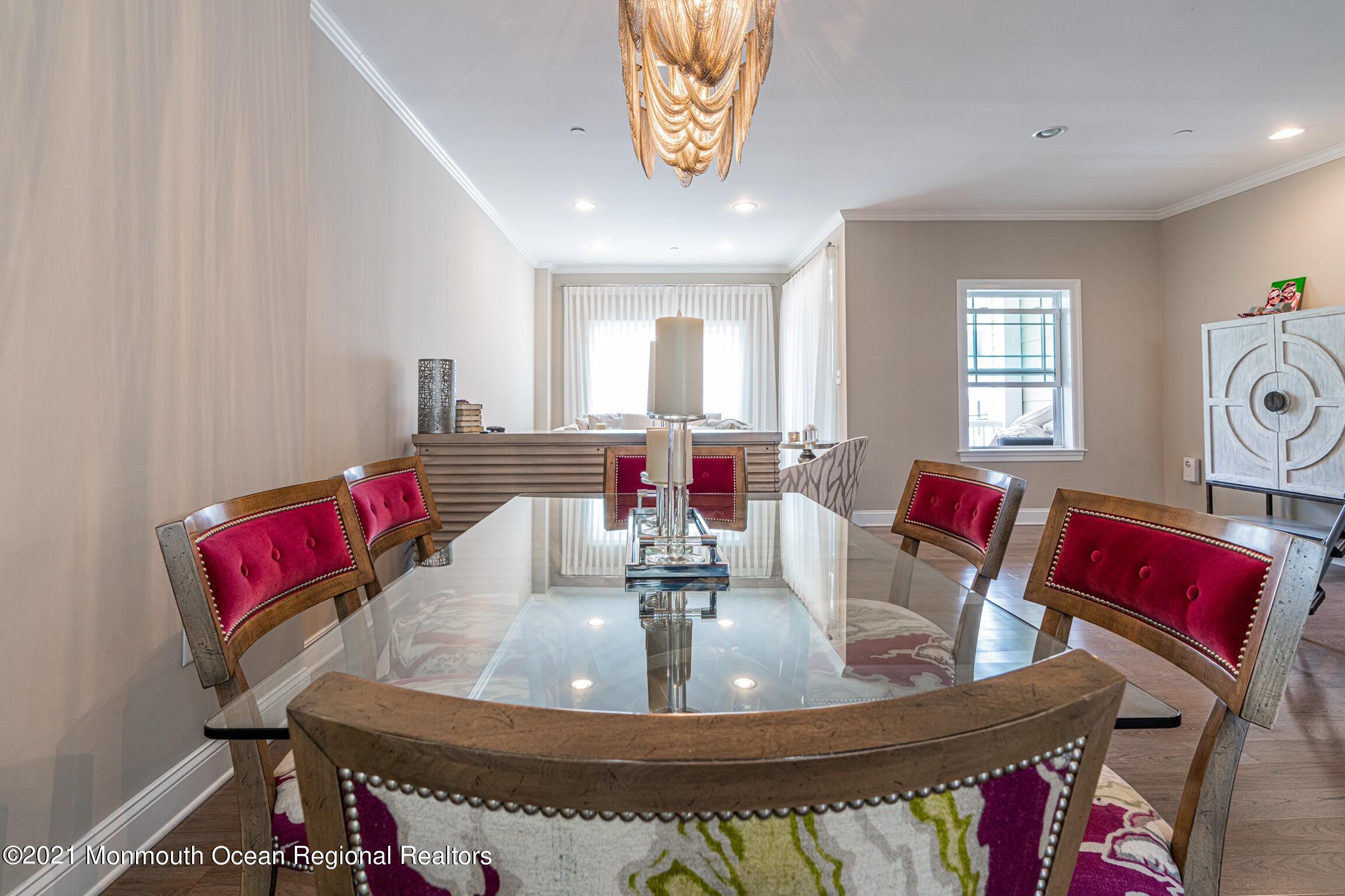 67 Ocean Terrace Long Branch, NJ 07740 - Photo 9 of 20 a dining room with furniture and wooden floor