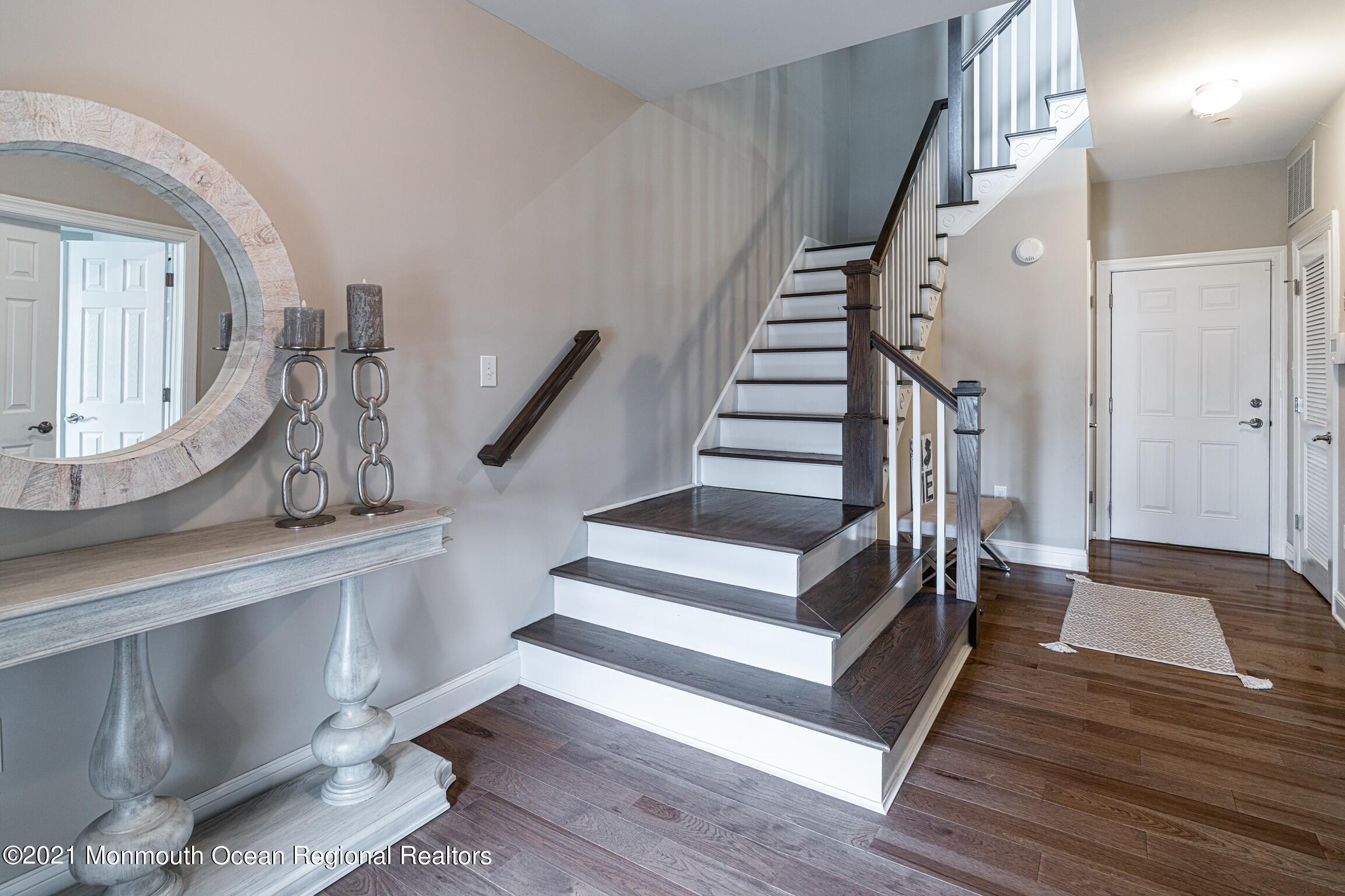 67 Ocean Terrace Long Branch, NJ 07740 - Photo 10 of 20 a view of entryway and hall with wooden floor
