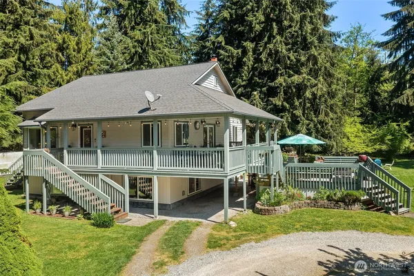 a house with trees in the background
