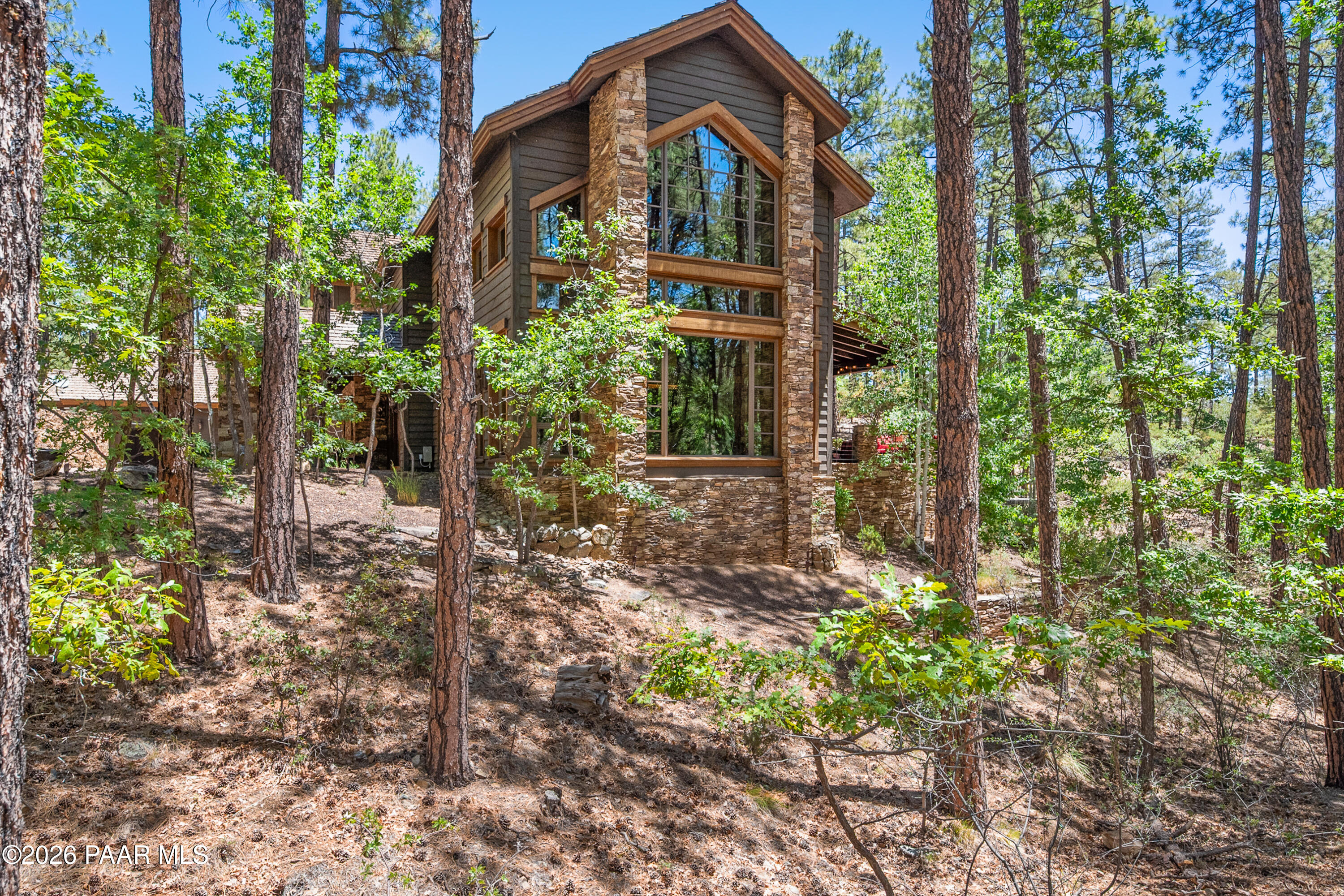 1515 High Valley Ranch Road Prescott, AZ 86303 - Photo 76 of 76 a backyard of a house with lots of green space